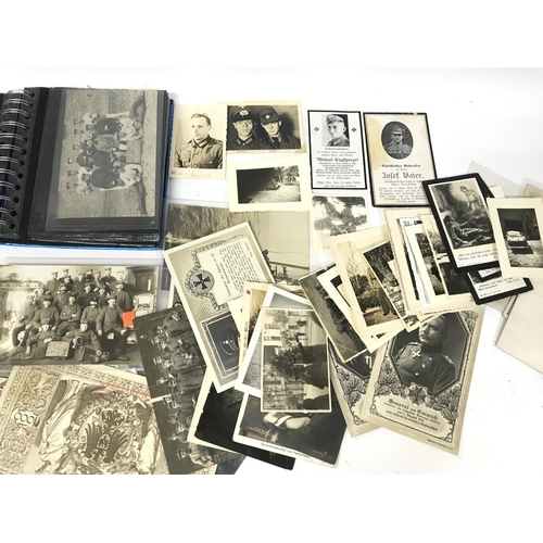 211 - A Collection of WW2 third Reich and other documents including photographs, Bystander postcards, docu... 