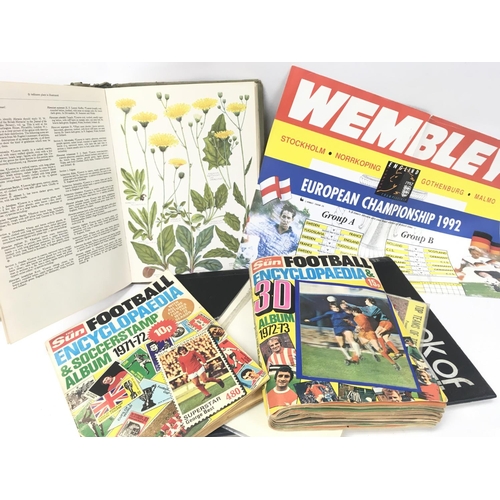 224 - A Collection of football related items including The Sun Football encyclopaedias, The Book of Footba... 