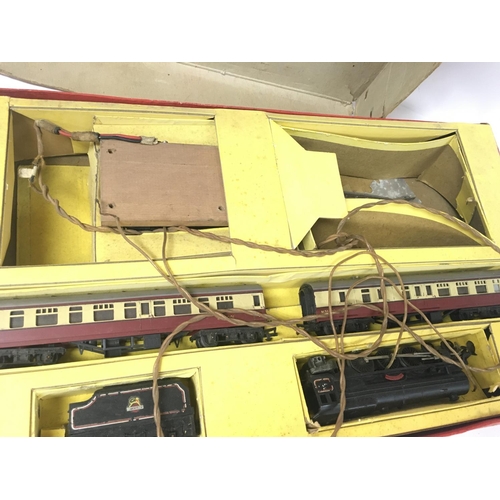 228 - A boxed vintage Rax Tri-Ang train set