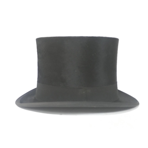 229 - A boxed Dunn & Co all black silk top hat