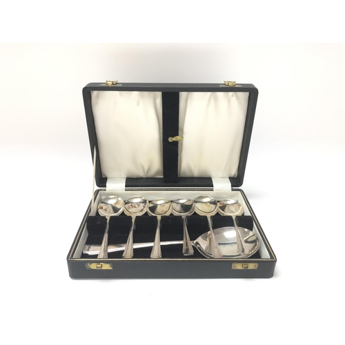 25 - Cased set of silver plated dessert spoons.