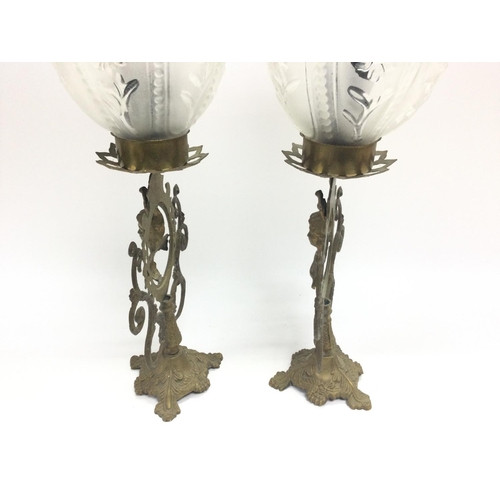 291 - Two Victorian brass and glass lamps one has damaged shade.
No reserve.