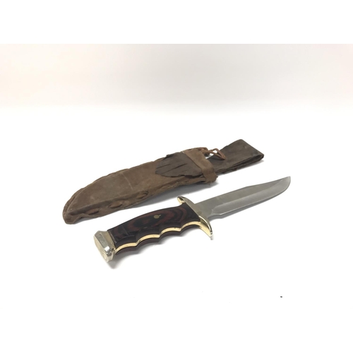 32 - Spanish combat knife with a belt attached scabbard.