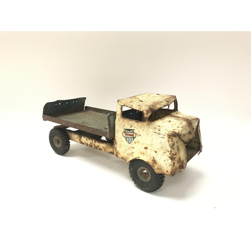 33 - A vintage tin plate toy truck.