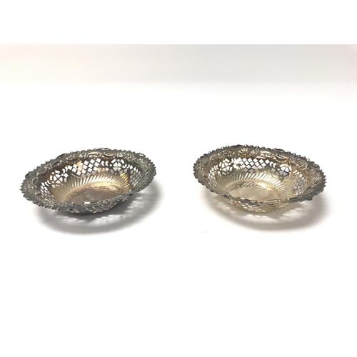 44 - A pair of pierced hallmarked silver dishes. (B)