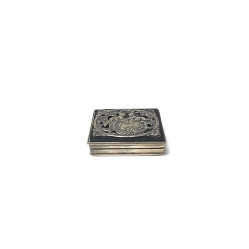47 - A small sterling silver pill box. (A)