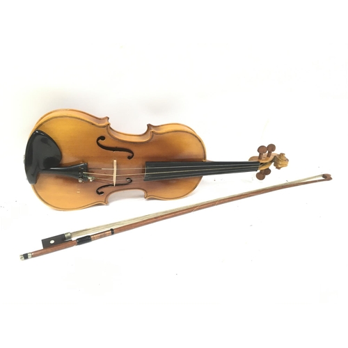 475 - A cased Lark violin , 56cm long. Postage category C