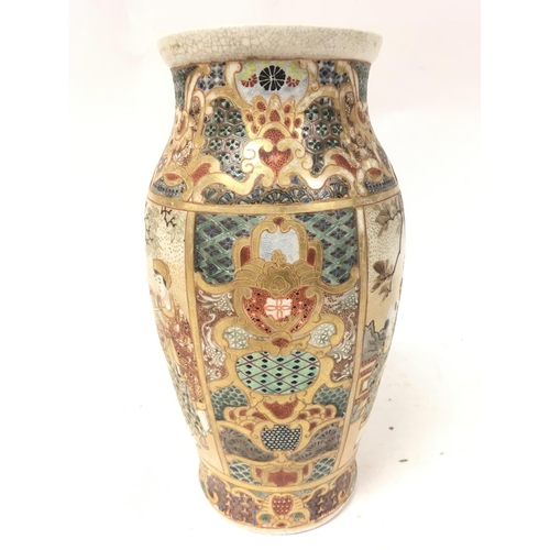 476 - A Japanese satsuma vase decorated with oriental figures. 23.5cm tall. Postage category D