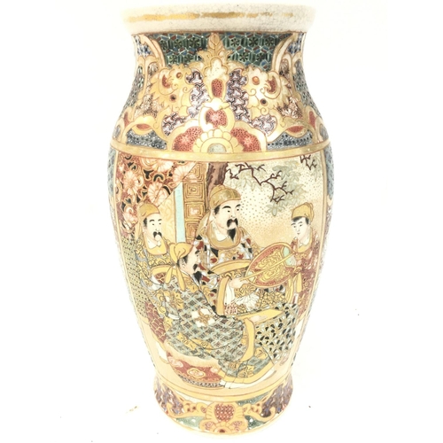 476 - A Japanese satsuma vase decorated with oriental figures. 23.5cm tall. Postage category D