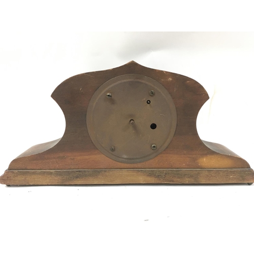 493 - A mahogany mantle clock with art nouveau painted decoration. 37 x 17.5cm (d)