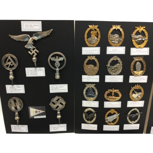 577 - An album containing retrospective German Third Reich badges and car pendants. Mounted on card.