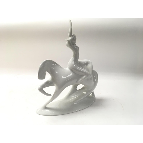 93 - Royal Dux modernist Figurine of a lady and horse.