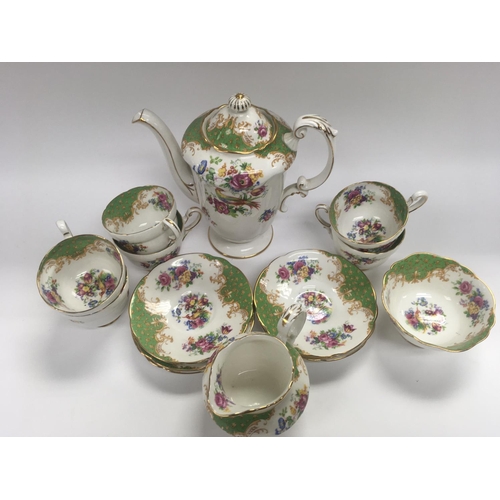 95 - A Paragon Rockinham pattern tea set comprising Teapot, 6 cups and saucers, Milk jug and Sugar bowl.