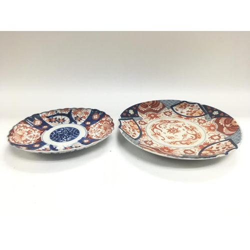 97 - 4 Japanese Imari wall plates.