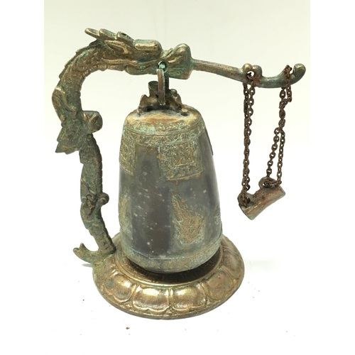 1018 - Old oriental brass table bell , 15cm tall. Postage category B