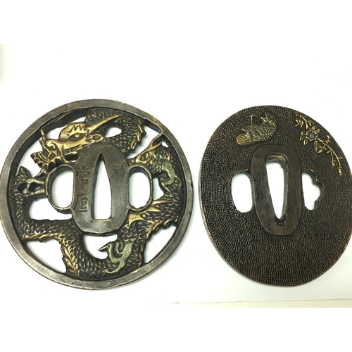 1025 - Two Japanese Tsuba, soap stone carvings, round boxes a brass pastel burner two small rickshaw orname... 