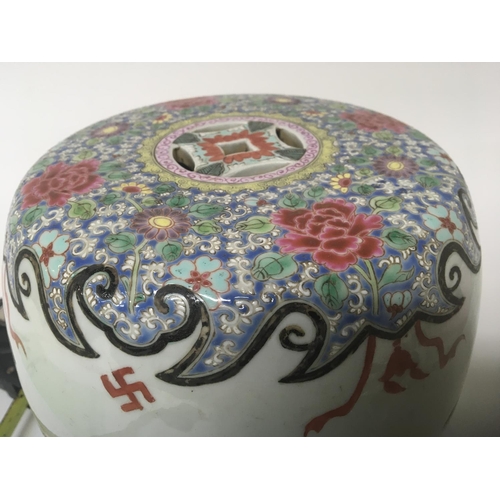 1032 - A small late late 19th Century Chinese Export famille rose porcelain seat. decorated with flowers fo... 