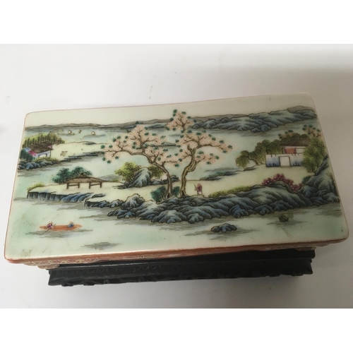 1035 - A Chinese enamel decorated brush stand decorated with a landscape view the sides with applied gilt o... 