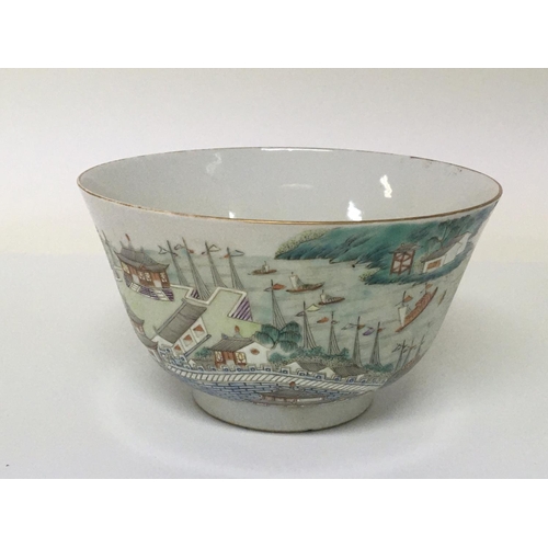 1037 - A Chinese Export Porcelain famille Vert bowl decorated with a harbour view buildings hand painted ca... 