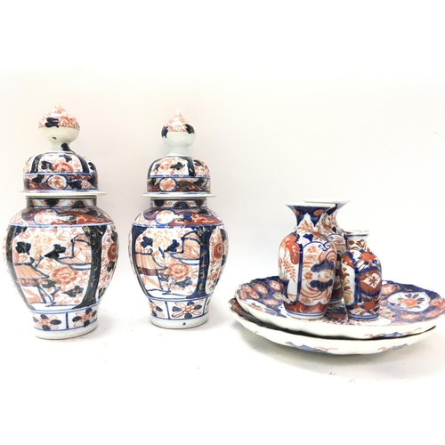 1064 - 19th century Japanese Imari porcelain vases (28cm tall) and plates. No obvious large damage or resto... 