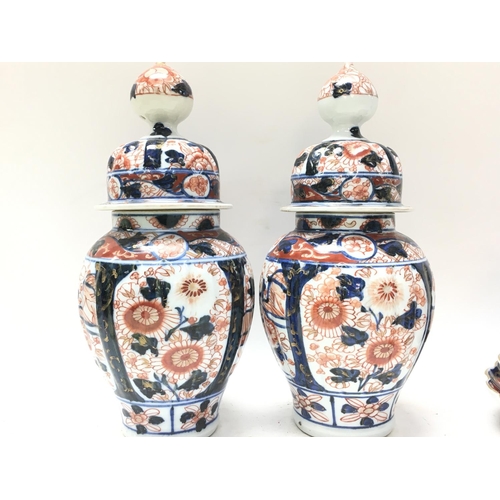 1064 - 19th century Japanese Imari porcelain vases (28cm tall) and plates. No obvious large damage or resto... 