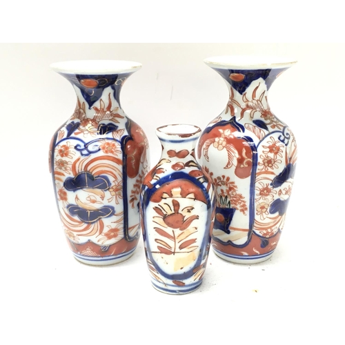 1064 - 19th century Japanese Imari porcelain vases (28cm tall) and plates. No obvious large damage or resto... 