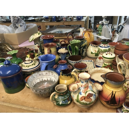 1119 - A large collection of Torque art pottery including wall plaques (a lot)- NO RESERVE