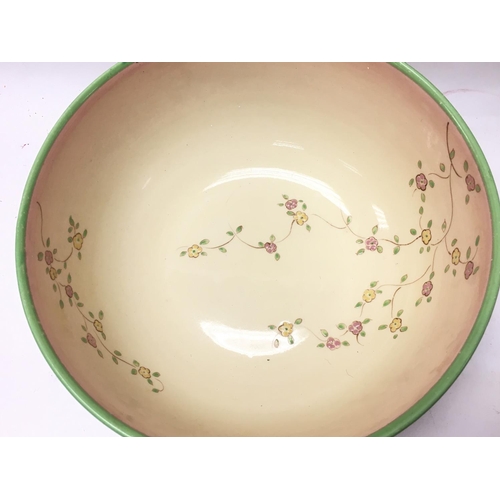 1130 - A Clarice Cliff Honeyglaze bowl, 19.5cm approximately in diameter. postage category D