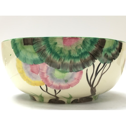 1130 - A Clarice Cliff Honeyglaze bowl, 19.5cm approximately in diameter. postage category D