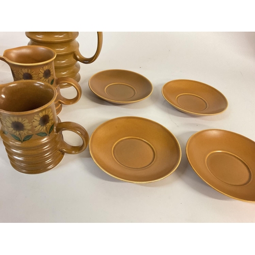 1148 - A 1970s sunflower pattern part coffee set by Carlton ware. Postage D- NO RESERVE