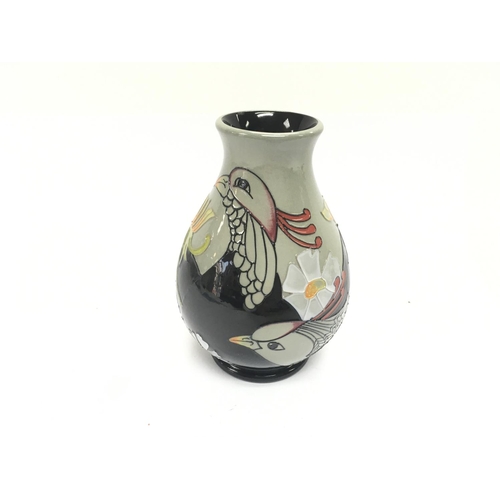 1200 - Moorcroft vase titled C Birds. 13cm tall. Good condition