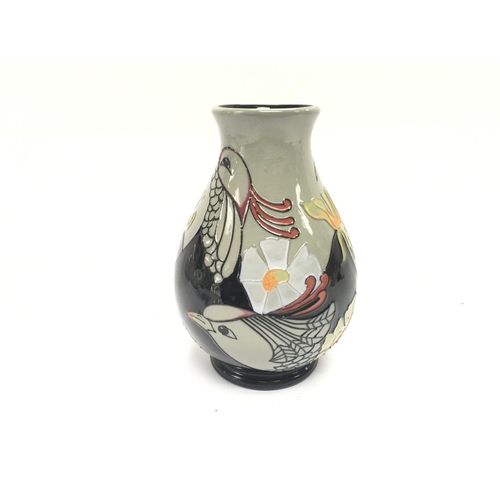 1200 - Moorcroft vase titled C Birds. 13cm tall. Good condition