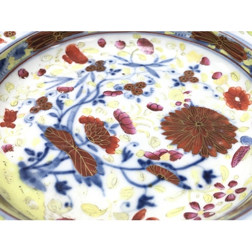 1204 - A 20th century Meissen porcelain charger with floral decoration. Some damage on the base and sides. ... 