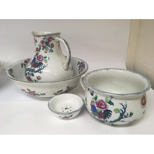 1238 - Two decorative ceramic jug and bowl sets one with a chamber pot.