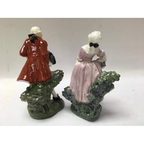 1245 - A pair of Royal Doulton figures Masquerade HN 600 no damage or restoration 17 cm .