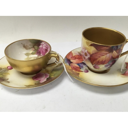 1253 - A Collection of four Royal Worcester cabinet cups decorated with flowers and foliage.