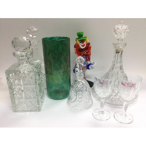 1258 - A small collection of glass including an Isle of Wight vase, Murano glass clown, decanters etc. Ship... 