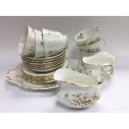 1260 - A Royal Albert tea set in Haworth pattern. Shipping category D.