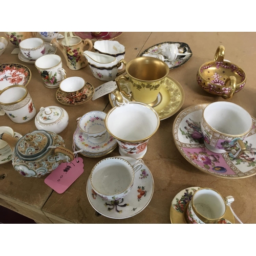 1263 - A collection of miniature cups and saucers including Derby and Dresden.