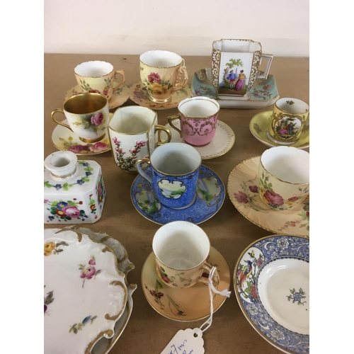 1264 - A collection of cabinet cups and saucers including Royal Worcester.