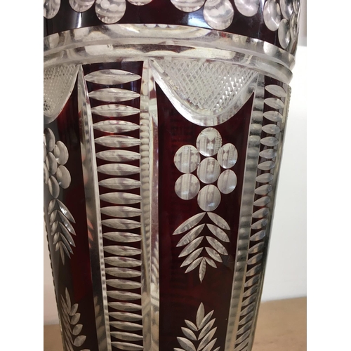 1265 - A large ruby cut glass vase . 45 cm