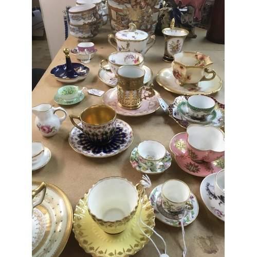 1269 - A collection of porcelain Cabinet cups and saucers Including Wedgwood and Doulton.