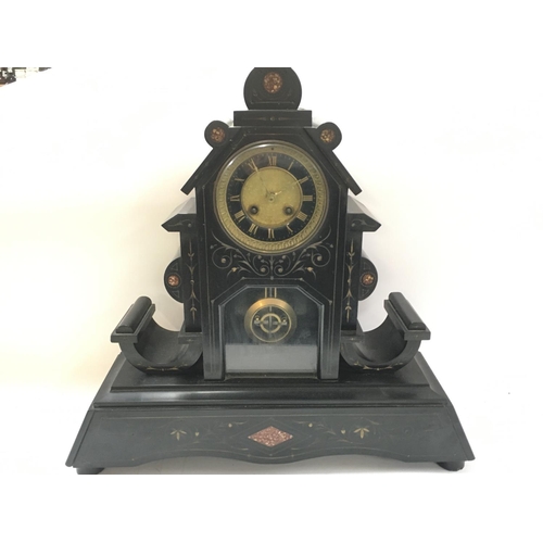 1406 - A slate mantle clock (loose foot). 47 x44cm Postage category D