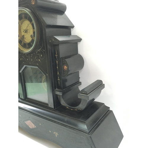 1406 - A slate mantle clock (loose foot). 47 x44cm Postage category D