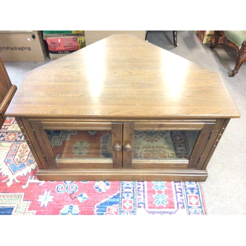 1428 - An Ercol Elm - Ash corner TV media cabinet. 96w 72d 55h (cm) Postage D- NO RESERVE