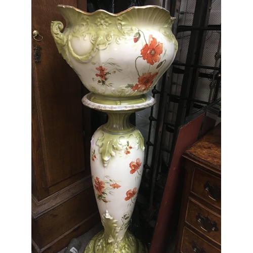 1510 - A Victorian jardiniere on stand decorated with poppies.