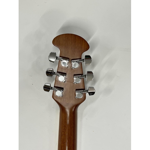 2397 - A Tanglewood Odyssey Acoustic Guitar sunburst finish with bowl back in very good condition with soft... 