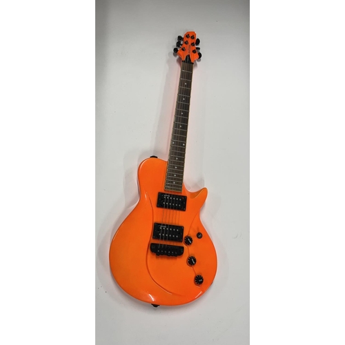 2399 - A Vibracell Switch Electric Guitar in bright orange finish -largely unplayed - comes with gigbag, le... 