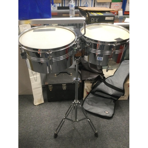 2402 - A pair of timbales on a stand fitted with a cowbell. Shipping category D.