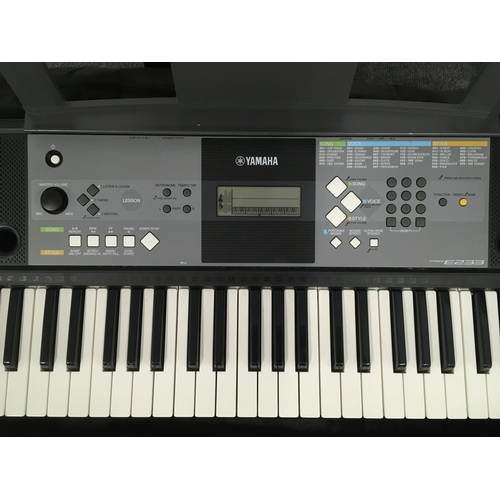 2404 - A pair of Yamaha Portable Keyboards comprising one boxed and one loose. Shipping category D.